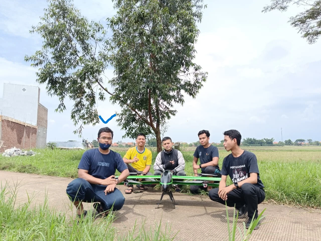 Budiman with the agricultural drone development team