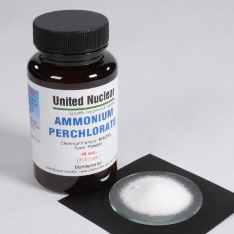 Ammonium perchlorate powder in a bottle and sample dish.